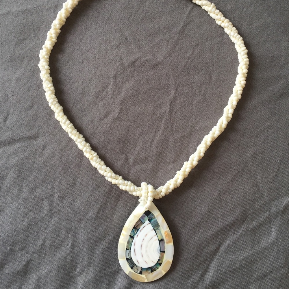 Triple strand beaded necklace with shell pendant (17.5”)